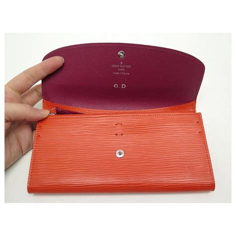 louis vuitton emilie wallet orange